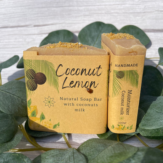 Vegan natural handcrafted Coconut Lemon soap, front and side to read the label in order to know that is made with real coconut milk and is specifically created to be a moisturizer soap with a tropical scent of coconut and  zesty lemon